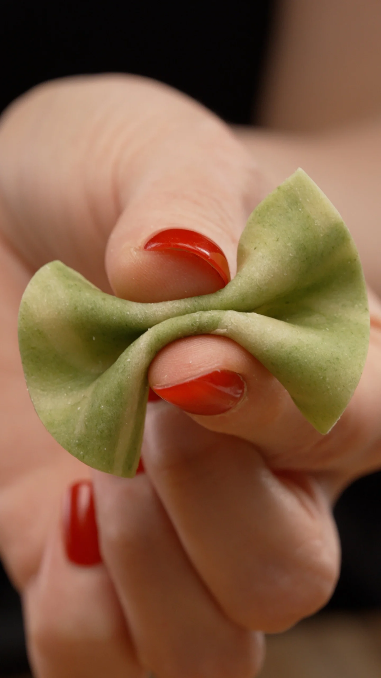 Handmade green farfalle pasta